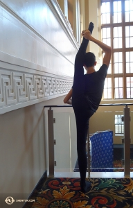 A throwback photo from earlier in this year's tour. Dancer Chengting Cai stretches at the Hippodrome Theatre in Baltimore, MD. (Photo by dancer Sam Pu) 